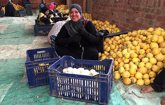 woman-peeling lemons